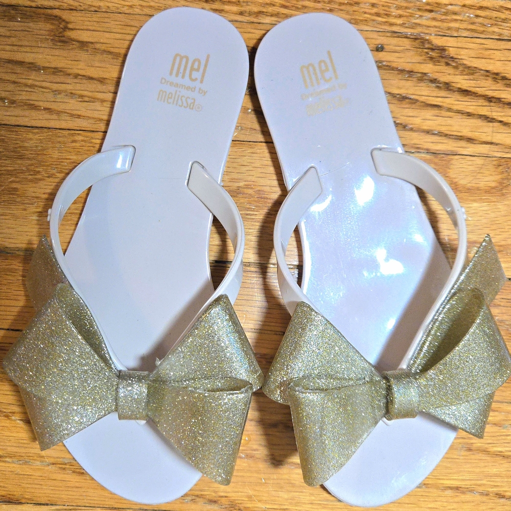 Size 13 Scented Mel Dreamed by Melissa Gold Harmonic Bow Flip Flops